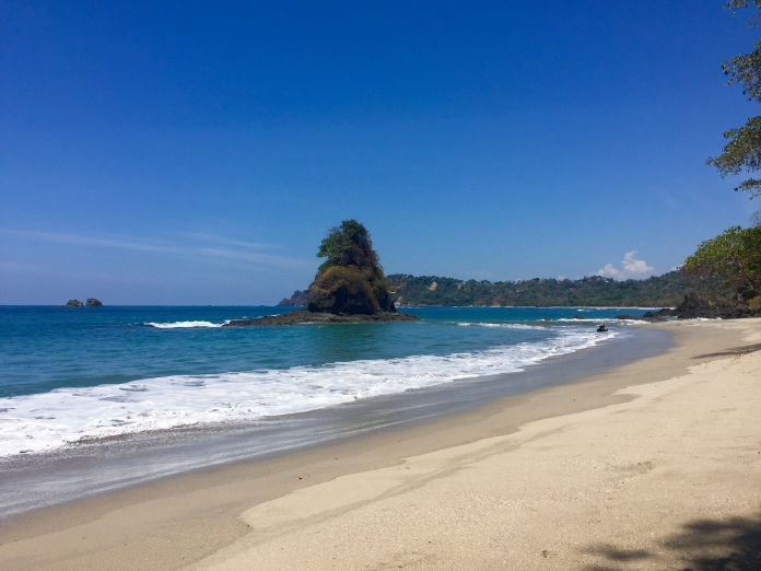 empty beach in Costa Rica after student clean up project